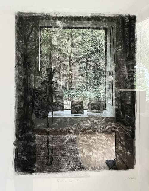 La Porte Rouge Roubaix boutique hotel display with forest imagery and digital devices