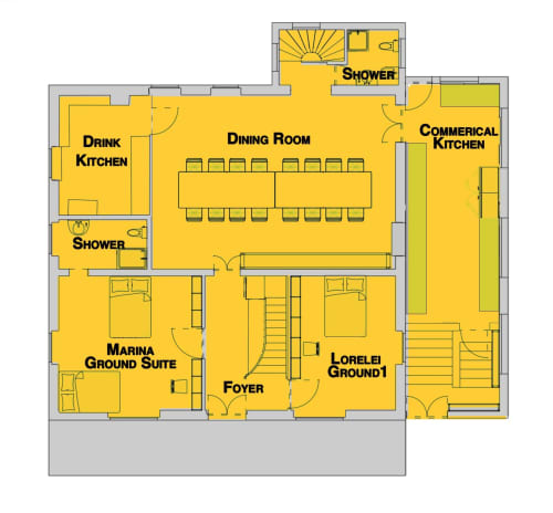 Planta baixa da Golden Mermaid Villa com sala de jantar, cozinha comercial, bar molhado, chuveiro e suíte Marina no térreo