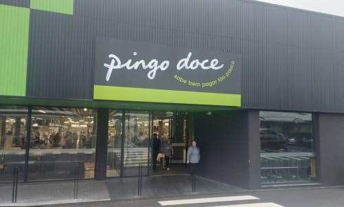 Pingo Doce storefront with green and gray signage at Golden Mermaid Villa shopping area in Portugal
