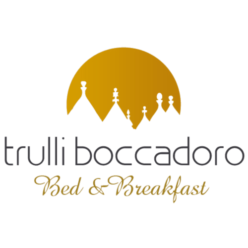 Logo Trulli Boccadoro Bed & Breakfast con cupola dorata e pedine bianche, ospitalità pugliese