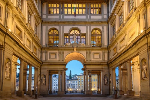Michelangelo Central Suites courtyard in Florence with Renaissance arches, columns, and classical architecture