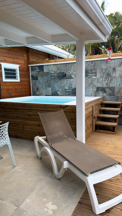Lounge chair by private pool at Filao Cottage in Sainte-Rose, Guadeloupe