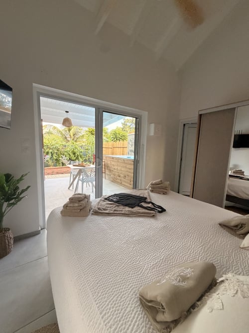 Filao Cottage bedroom with ocean view patio, Sainte-Rose Guadeloupe