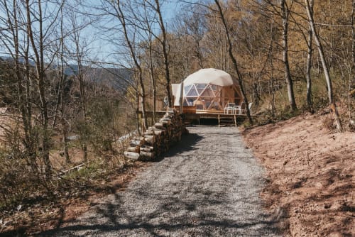 Geodesic dome cottage at Les Cabanes du Nideck nestled in forested mountains near Oberhaslach, France