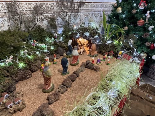 Christmas nativity scene display at Golden Mermaid Villa B&B in Ribeirinha, Portugal with miniature figures and festive