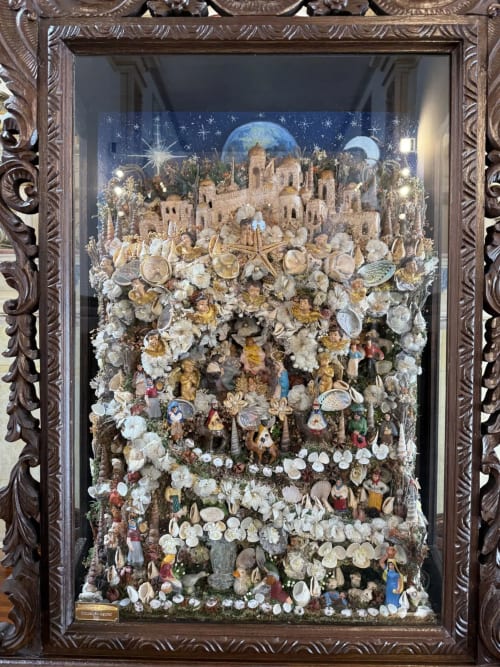 Ornate framed nativity scene with shell decorations at Golden Mermaid Villa, Ribeirinha Portugal