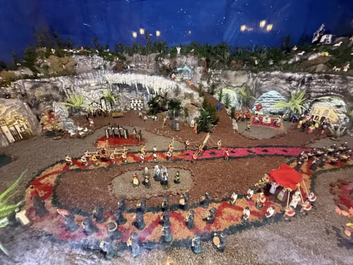 Detailed miniature nativity scene at Golden Mermaid Villa, Ribeirinha Portugal, evening display