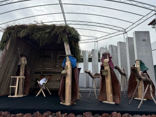 Viking village display with wooden figures and thatched hut at Golden Mermaid Villa in Ribeirinha, Portugal