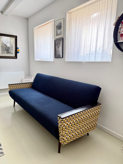 Navy blue sofa with geometric patterned sides in l'Atelier des Dépendances, Lipsheim
