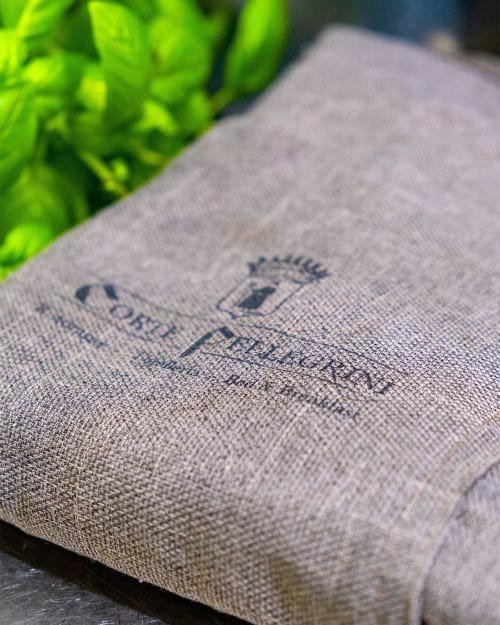Corte Pellegrini towel detail with embroidered logo, Verona bed and breakfast
