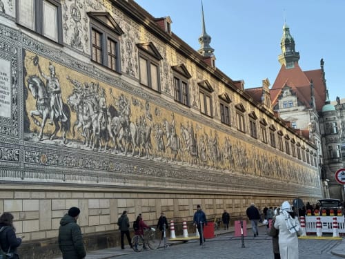 Historic building facade with ornate frescoes in Ribeirinha, Portugal near Golden Mermaid Villa