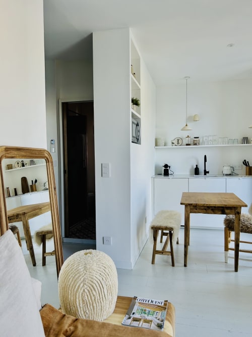 Modern kitchen area in Casadilonda apartment at Casa di Bastia, Bastia with wooden furniture and white cabinetry