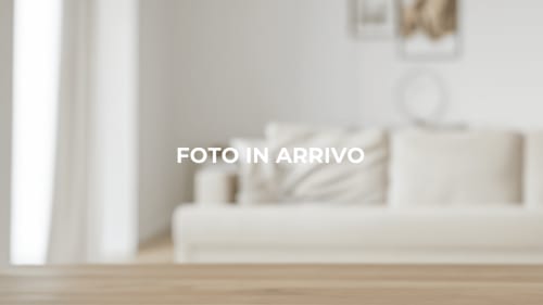 Camera matrimoniale luminosa e minimalista a Vento del Sud B&B con arredi bianchi e luce naturale