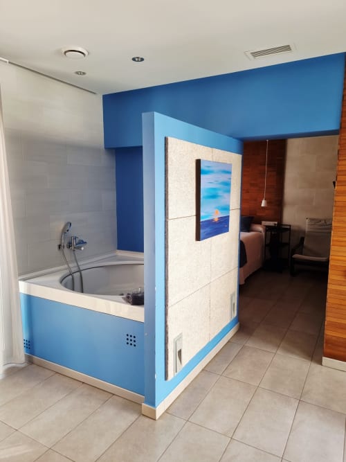 Modern bathroom with blue and light stone private Jacuzzi at El Arrecife de Conil, Conil de la Frontera