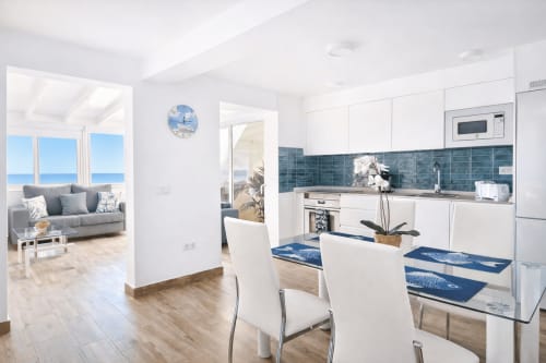 Modern kitchen and dining area with sea view in Apartamento Severo 3, La Aldea de San Nicolas