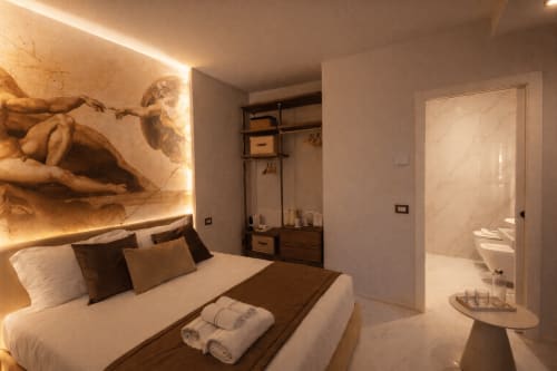 Lussuosa camera matrimoniale presso Michelangelo Central Suites a Firenze con illuminazione moderna, letto king size e bagno privato