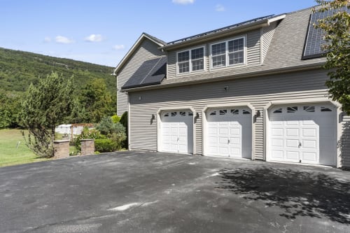Modern two-story home with three-car garage in Highland Mills