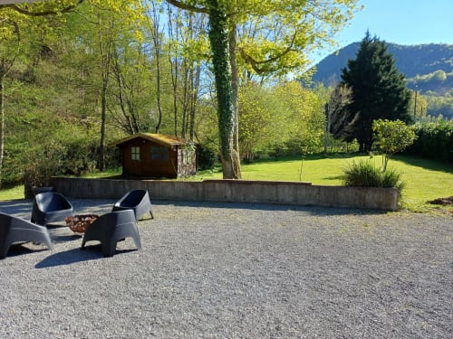 Rustic wooden cabin with mountain views at Le gite des mousquetaires B&B in Lanne en Baretous, France