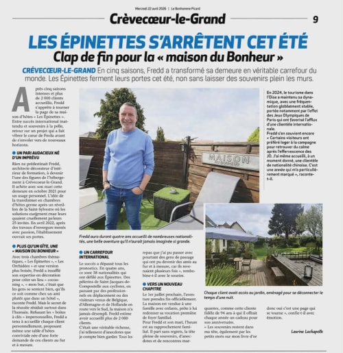 Fredd standing in garden at Les Épinettes bed and breakfast in Crèvecœur-le-Grand, France