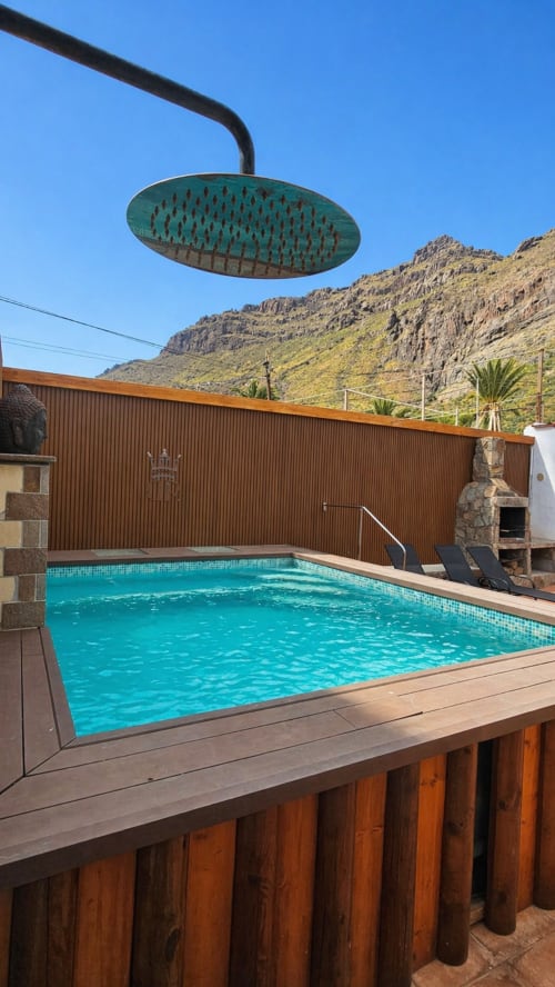 Vista a la montaña, piscina climatizada y ducha exterior en Villa DR en La AldeA, Gran canaria