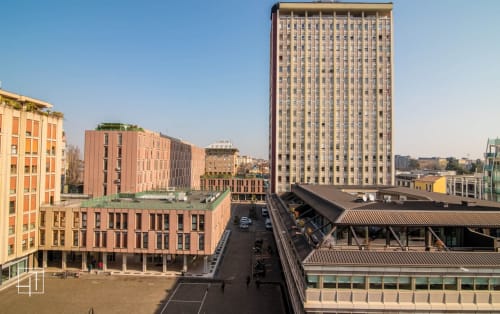 Padova city view from Hometoday apartment with historic buildings, modern high-rise, and urban street scene