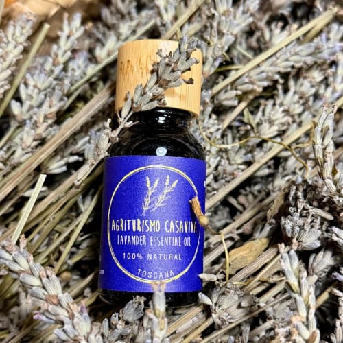 Agriturismo CasaViva lavender essential oil bottle on dried lavender from Toscana