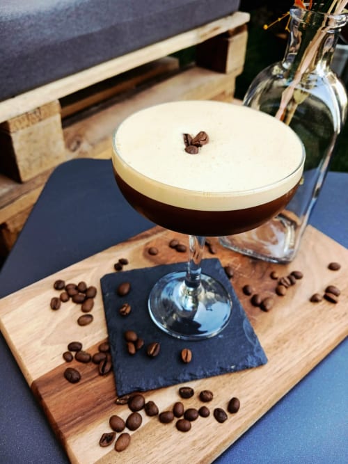 Espresso martini cocktail with coffee beans at Clos De La Gourmandiere in Saint-Lothain, France