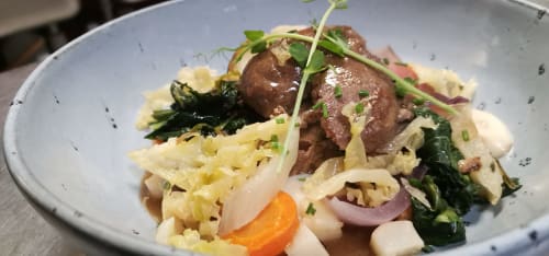 Gourmet plated dish with beef, noodles, and vegetables at Auberge du Pont de l'Alp, Le Monêtier-les-Bains