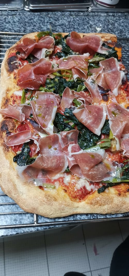 Prosciutto and sautéed spinach pizza at Auberge du Pont de l'Alp in Le Monêtier-les-Bains, France