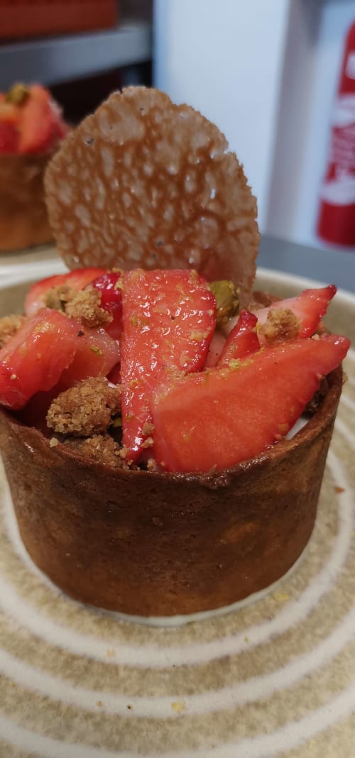 Elegant chocolate dessert with fresh strawberries and crumble at Auberge du Pont de l'Alp, Le Monêtier-les-Bains