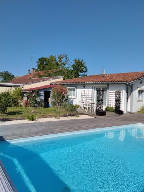 Swimming pool overlooking La Pause Landaise villa with terrace in Magescq, France