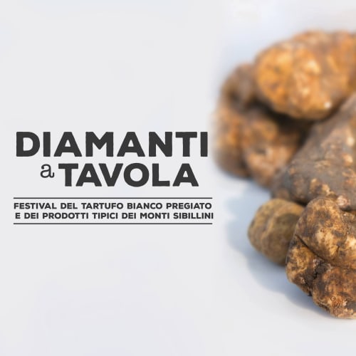 Manifesto del festival dei tartufi Diamanti a Tavola con tartufi bianchi dei Monti Sibillini vicino ad Amandola