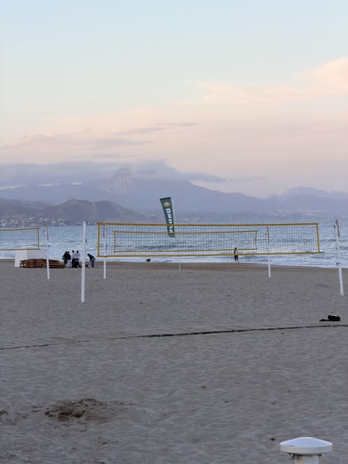 Beach volleyball nets at sunset with Table Mountain view, El Chalecito de Alicante hotel, Spain