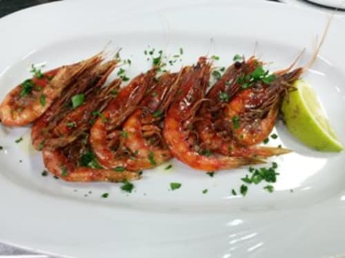 Grilled shrimp skewers with herbs and lime at Hotel Ristorante Domu Incantada in Muravera