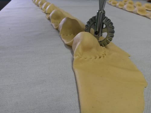 Homemade pasta sheets lined up at Hotel Ristorante Domu Incantada in Muravera
