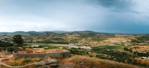Stone structure overlooking Penamacor valley with river, mountains and green countryside at Moinho do Maneio