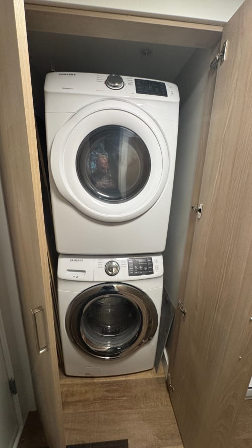 Stacked Samsung washer and dryer in Northstar 37 apartment closet, Whistler vacation rental