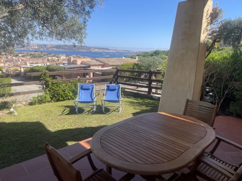 Sea view garden apartment at Like at Home Palau with furnished terrace overlooking Mediterranean coast
