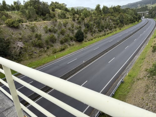 Modern highway with vegetation near Golden Mermaid Villa in Ribeirinha, Portugal