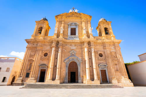 Golden Baroque cathedral facade in Padova, Italy near Palazzo Vittoria & Il Maestrale