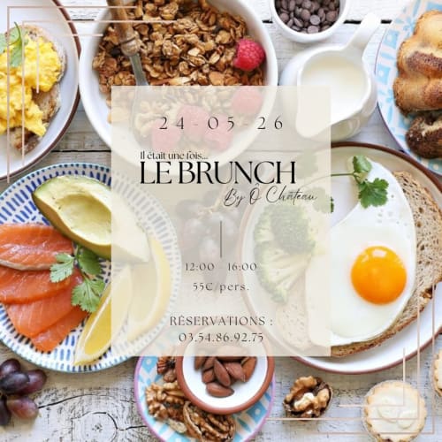Le Brunch at Ô Château in Hayange - gourmet breakfast spread with eggs, salmon, avocado, bread and pastries