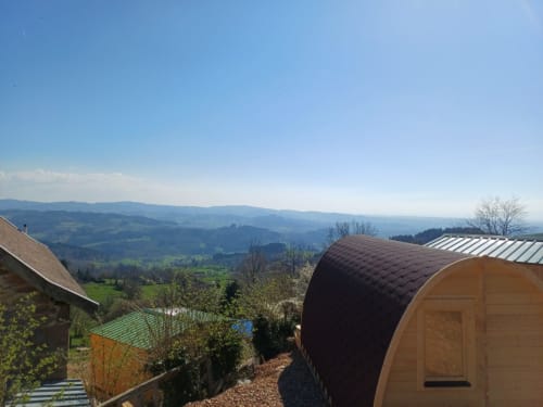 Pod accommodation with mountain valley views at La Maison de Dun, Saint Racho France