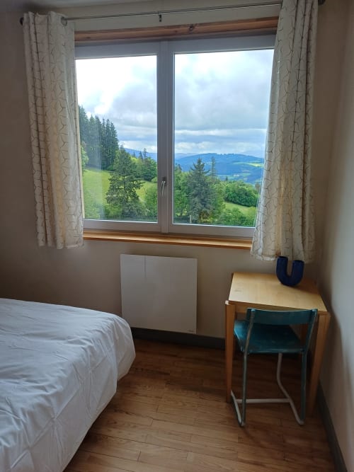 Bedroom with mountain views at La Maison de Dun B&B in Saint Racho, France