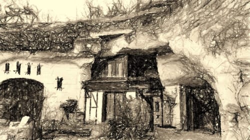 Rustic troglodyte dwelling at Les Troglos de Beaulieu, Beaulieu-les-Loches, with ivy-covered stone facade and traditional