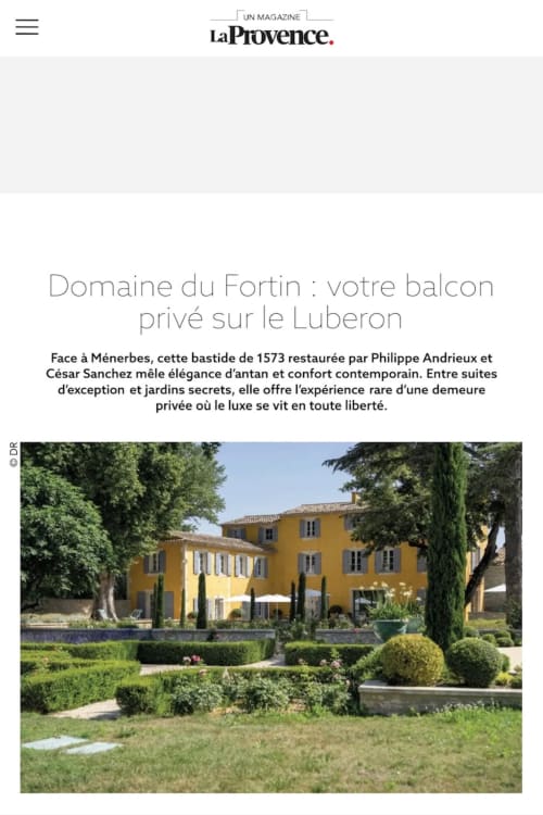 Le Domaine du Fortin, a yellow Provençal bastide in Ménerbes with manicured gardens and cypress trees