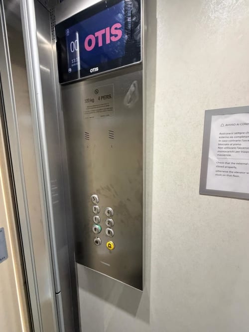 OTIS elevator interior at Versilia Panoramic Luxury hotel in Como, Italy with floor buttons and display screen