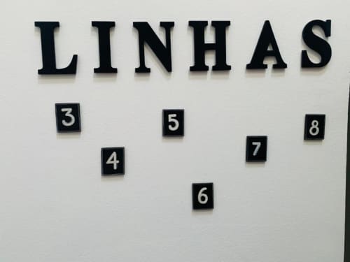 Signage for Linha rooms 3-8 at Campanhã Boutique Station hotel in Porto, Portugal