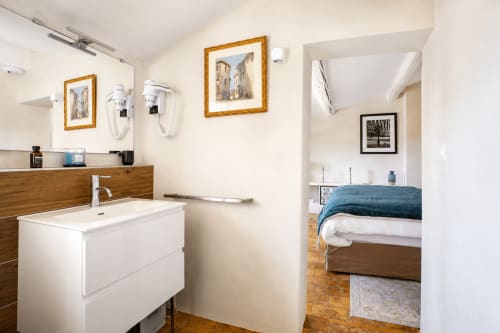 Modern bathroom in Suite Sainte Victoire at Les Suites de Montigny, Aix-en-Provence, connecting to bedroom
