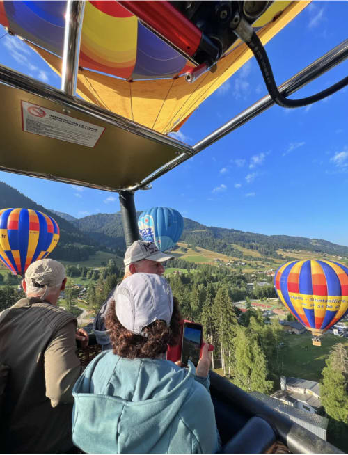 Guests viewing hot air balloons from Chez Francine in Notre Dame de Bellecombe, French Alps