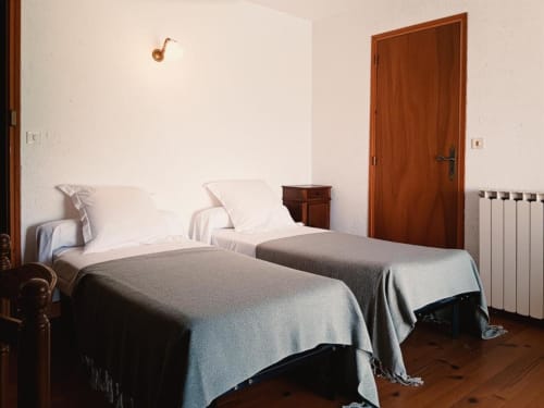 Twin bedroom with mountain view at Domaine de Cabrières B&B in St Jean Du Gard, France
